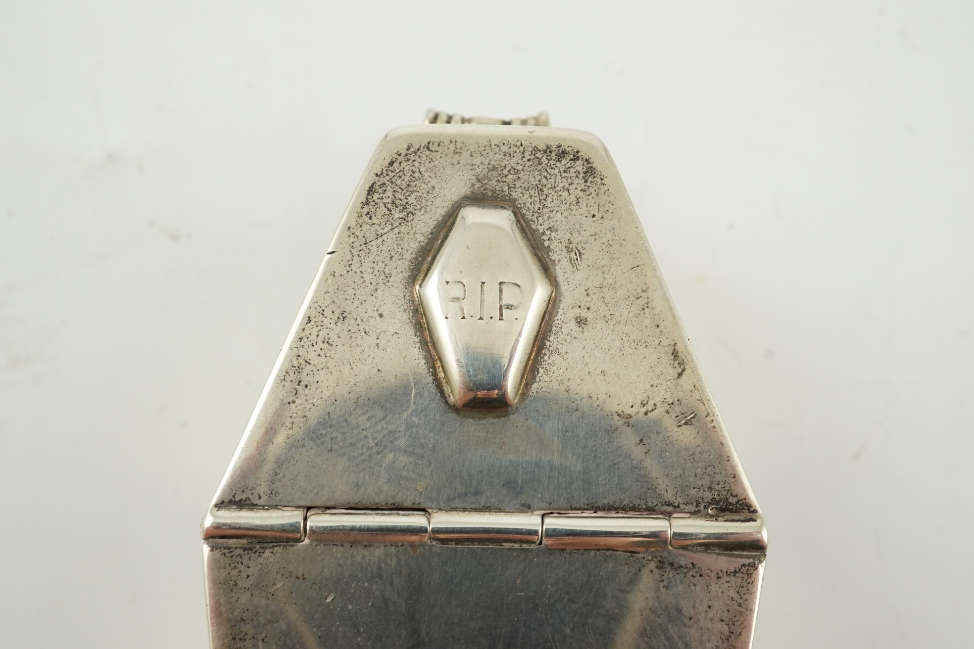 A George VI novelty silver snuff box, modelled as coffin with two handles and an 'RIP' appliqué, maker HW